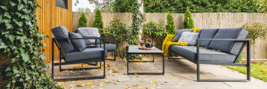 Grey furniture in the garden of elegant home